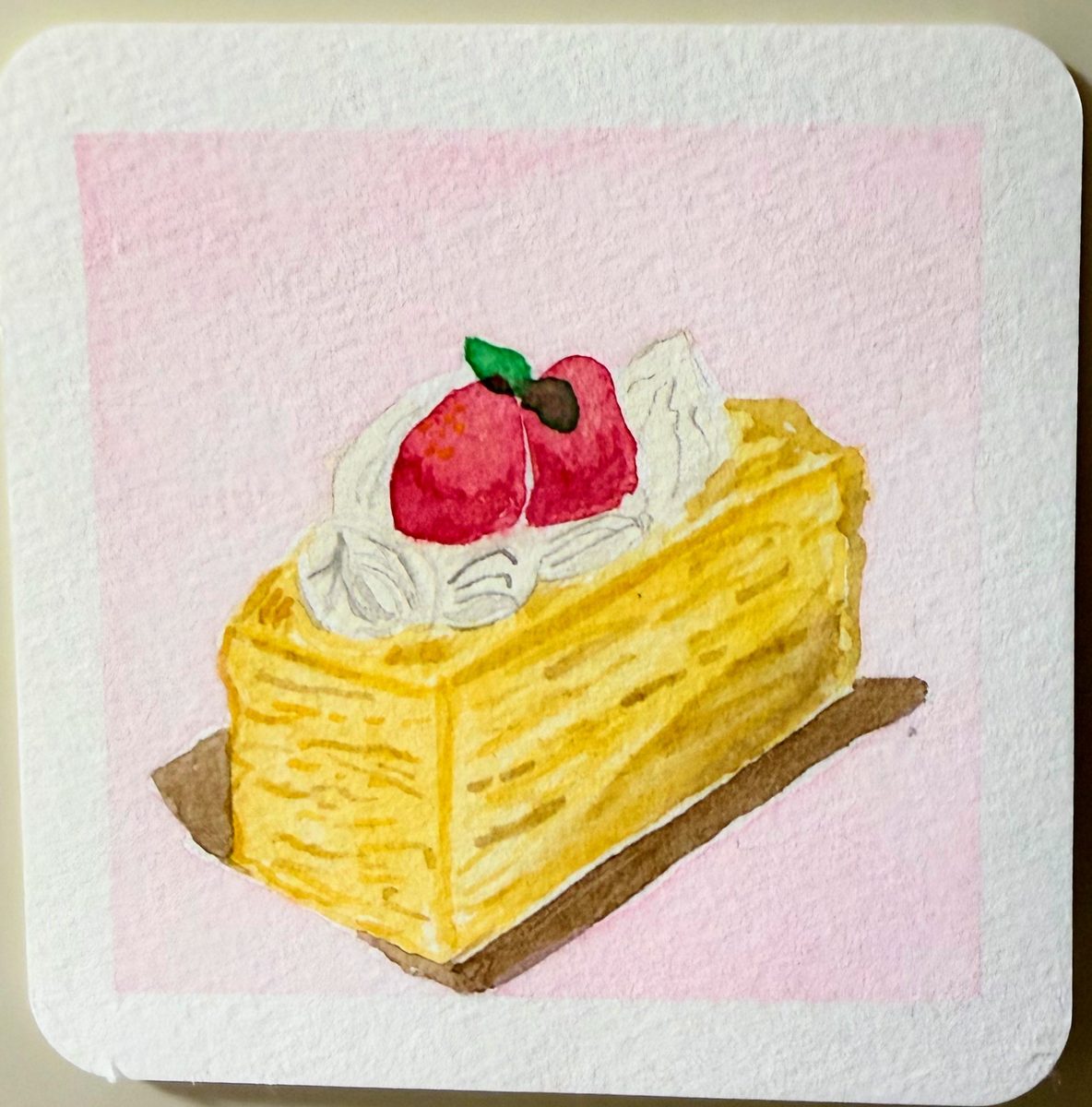 いちごののったミルクレープの水彩イラスト